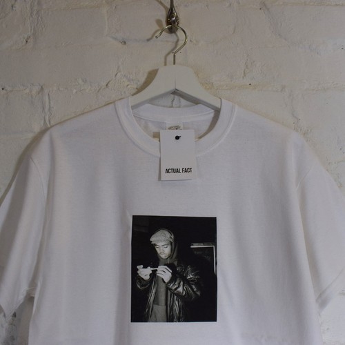 Nas rolling spliff - a, white