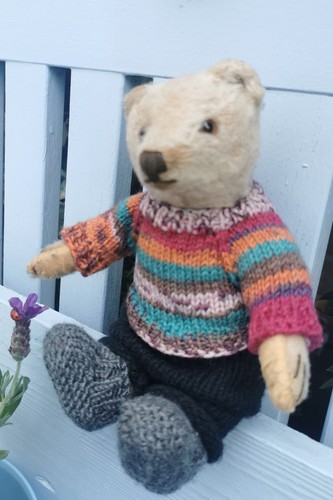 Hand knitted teddy bear - hand,