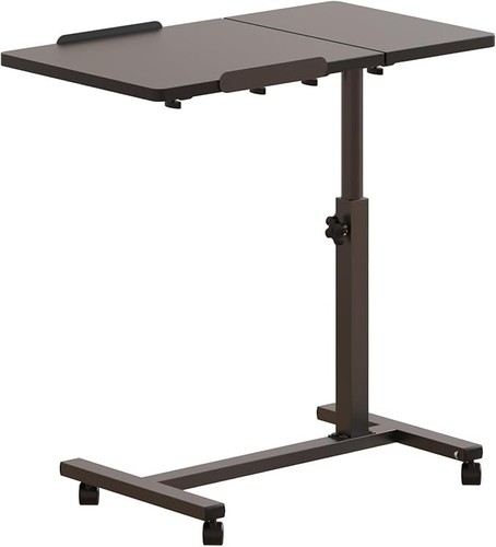 Over the bed table with - bed,