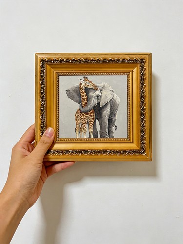 Elephant hugging giraffe - elephant,