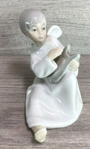 Nao lladro boy playing harp - boy,