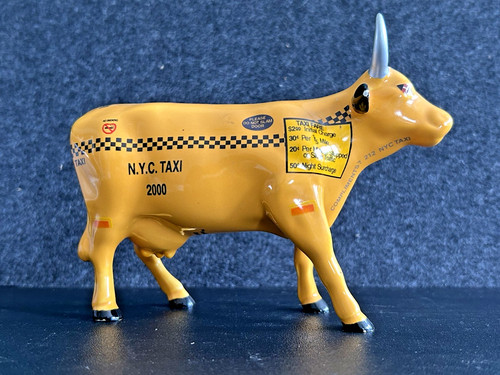 Cow parade figurine - parade,