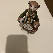 Sculpture featuring  meerkats