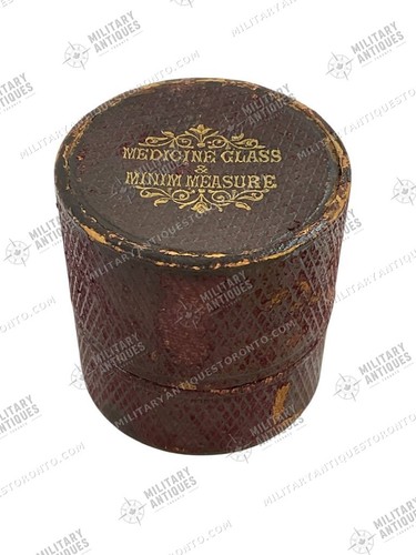 Medicine glass and minim - medicine,