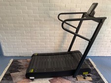 Manual curved treadmill