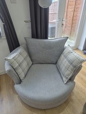 DFS Grey Swivel Cuddle Chair