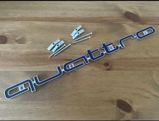 Blue And Chrome Quattro Badge