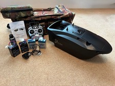 Bait boat with extra batteries and original carry cases..