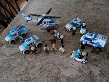 POLICE VANS, MOTORCYCLE, DOG