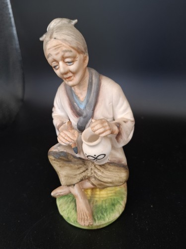 Fig seated person - a,