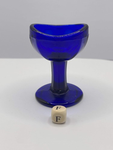Old blue glass eye - , (f)