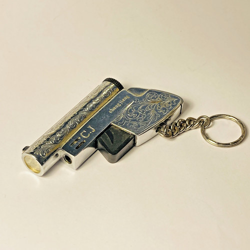 Pistol shaped lighter - shaped, metal