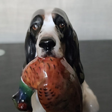 Royal Doulton Medium Black & White Cocker Spaniel with Pheasant in Mouth HN 1138