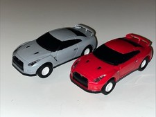 Unbranded Nissan GTR Slot Cars X2 Red Grey Working Lights 1:43?