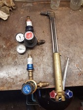 OXY ACET CUTTING TORCH c/w nozzle, & clocks with flashback arrestors