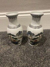 A Pair Of Chinese Porcelain Vases