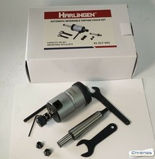 AUTOMATIC REVERSIBLE TAPPING