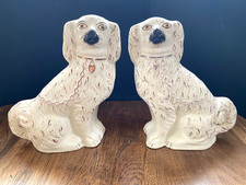 A pair of antique Staffordshire Spaniel Dogs 24cm/9.5”  high