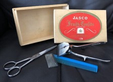Collection of vintage hairdressing/grooming kit in wooden Jasco Fruits box