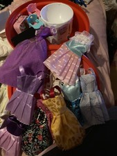 Large Bundle Of Barbie Size Dolls Clothes With Shoes, accessories.