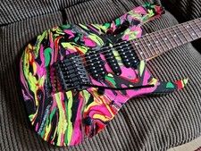 Ibanez 7-string guitar with custom swirl finish