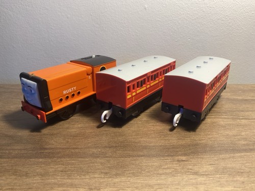 Rusty and coaches - and, tomy