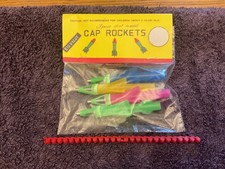 VINTAGE childs toy cap rockets x4 comes with free gift accessories 2 x packs 