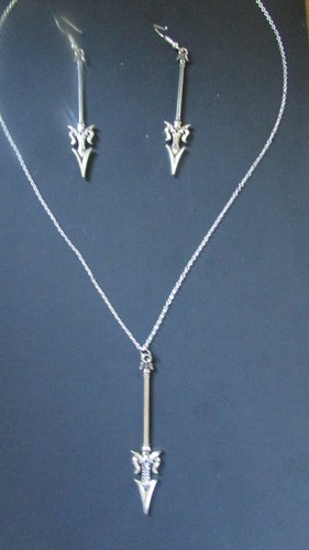 Pendant and earrings with - and,