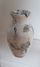 Bespoke black and white clay covered vase - approximately 19cm tall by 11cm.