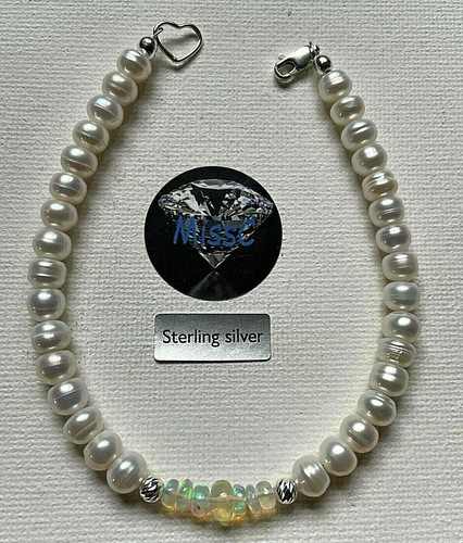 Pearl and ethiopian fire - fire, opal