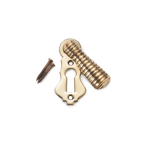 Aged brass beehive escutcheon - beehive,