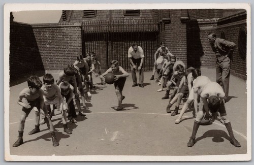 Clerkenwell schoolboys playing - schoolboys,
