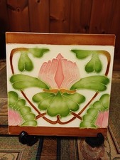 Antique Art Nouveau Pottery Tile. Stylised Lily Design. Good Used Condition.