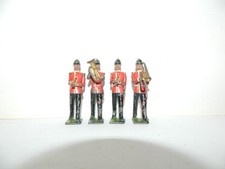4 PRE WAR BRITAINS LEAD LINE INFANTRY BAND SOLDIERS