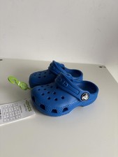 Blue Crocs classic clogs