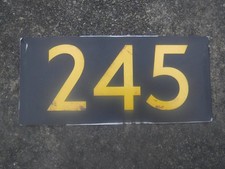 Bus running number plate 245