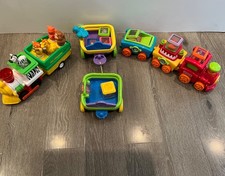 Fisher Price Peek a Boo Blocks Circus Train 7 Peek a Boo Blocks & Chad Valley.