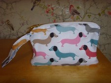 MULTI SAUSAGE DOG PRINT  COTTON  ZIPPED PURSE 20cm X  13cm WRIST STRAP