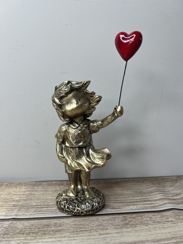 Gold girl with red heart - with,