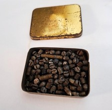 Meccano vintage grub screws of various sizes in tin.
