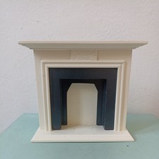 Dolls house white - dolls, fireplace