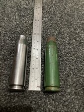 Two Large Gun Shells