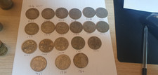 Collection of half crown British coins 1921 to 1967, spans both World Wars