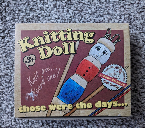 Prof warbles knitting - prof., doll