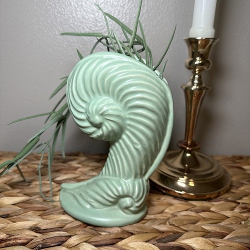 Mcm mint green nautilus shell - mint,