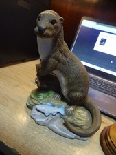 Leonardo Otter AND WISE OWL FIGURINES