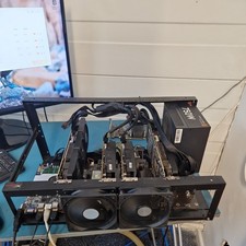 Crypto bitcoin mining rig including 4x NVIDIA professional mining GPUs, working