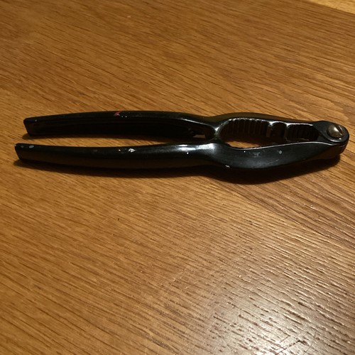 Vintage black metal nut - black,