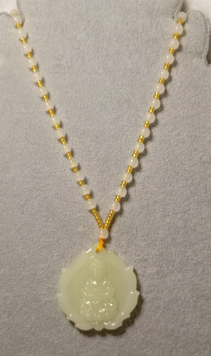 Cream jade deity - cream, carved