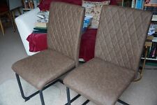 Two faux leather cantilever